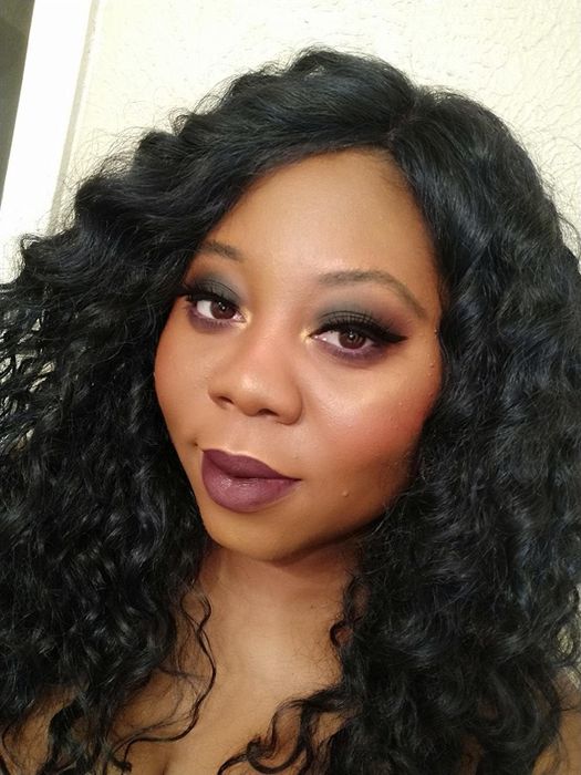 reviewer wearing the lipstick in the shade originator