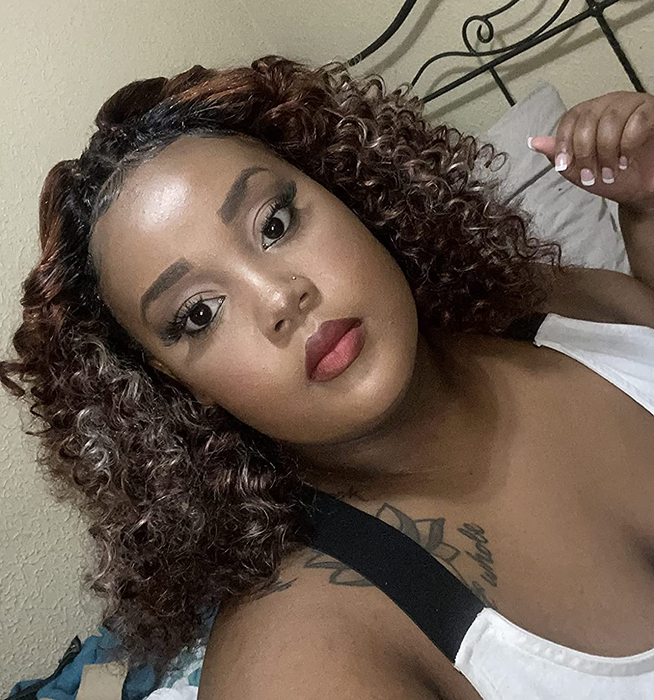 A reviewer's flawless makeup look achieved with the NYX setting spray