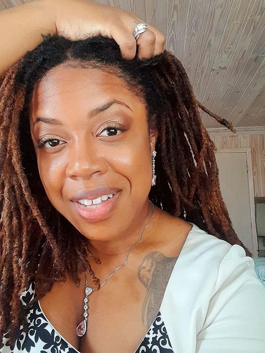 reviewer showcasing cappuccino foundation applied to the face