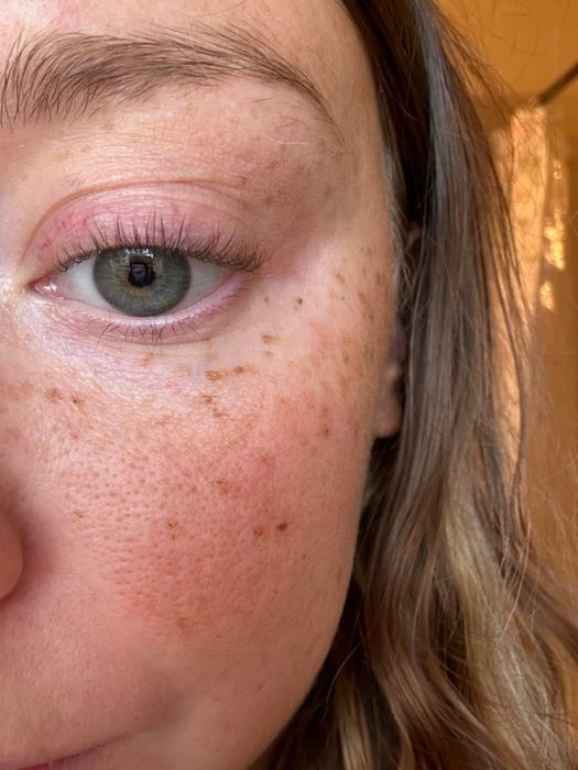 The same reviewer showing their lashes after curling them