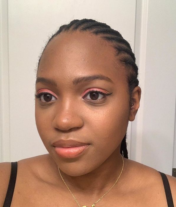 reviewer showcasing caramel concealer