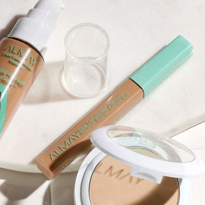 An image of the concealer alongside other Almay makeup products