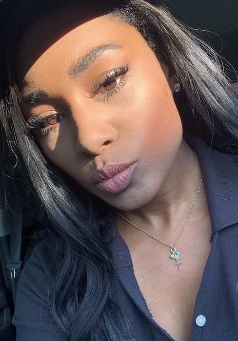 A reviewer sporting a red-brown tint as blush.