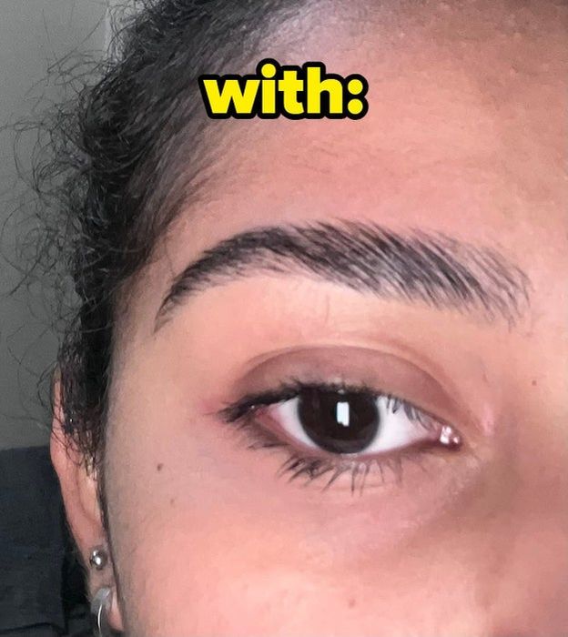 An after photo of the same reviewer’s lashes, now thick and defined after applying the eyebrow gel.