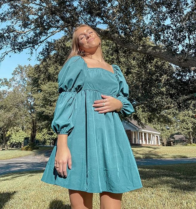 reviewer modeling the dress
