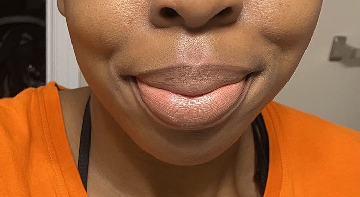 a reviewer photo of them wearing the lip liner