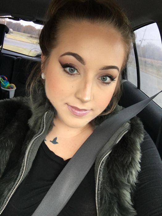 A reviewer showing off their bronzed makeup look