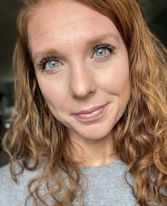 a reviewer wearing the mascara for a bold lash look
