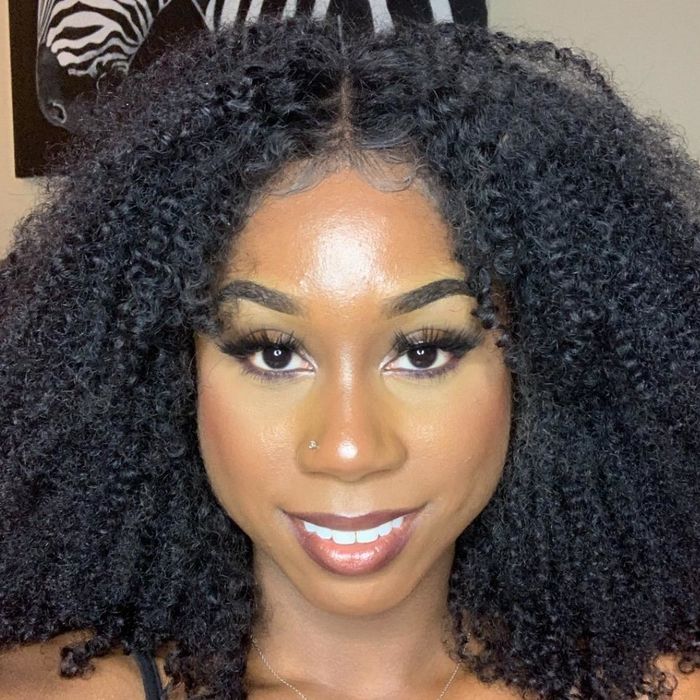 A reviewer wearing the concealer to demonstrate its effect