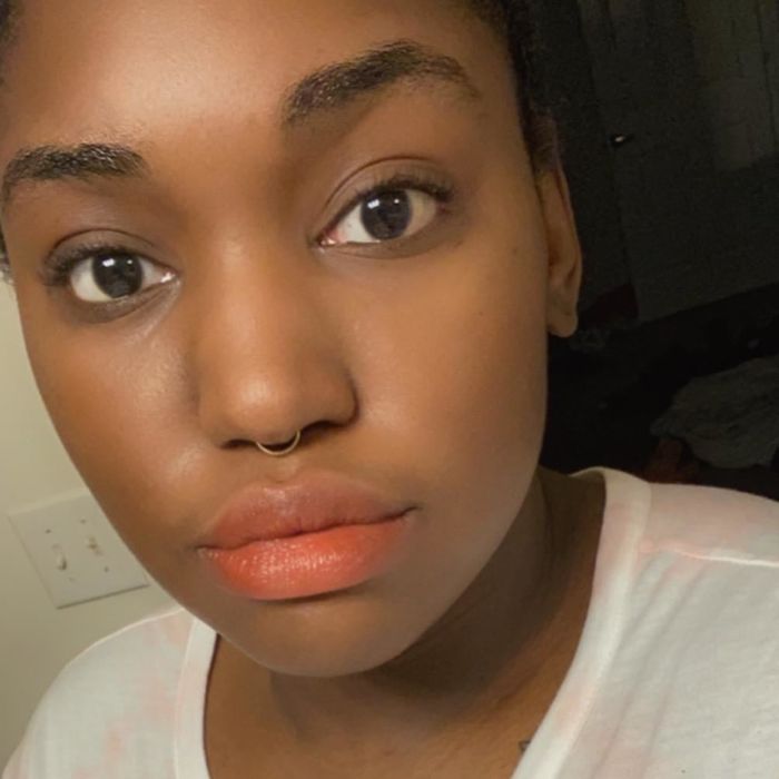 reviewer wearing girlish red lip tint