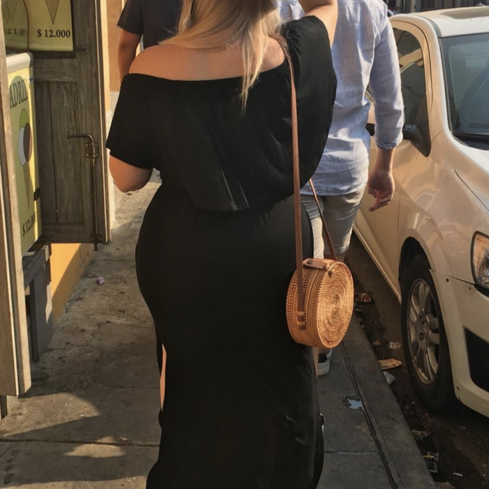 reviewer showcasing the back of the dress