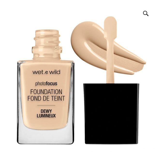 Wet n Wild photofocus foundation bottle, featuring a small amount of product on its surface and a sleek black cap