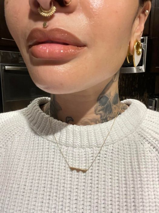A close-up view of lips after applying Anastasia Beverly Hills lip liner.
