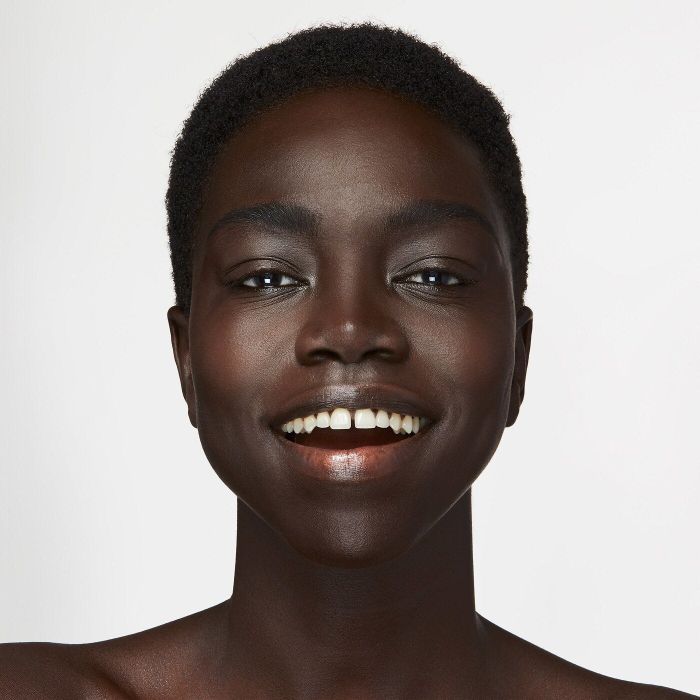 a reviewer showcasing the foundation applied to their face