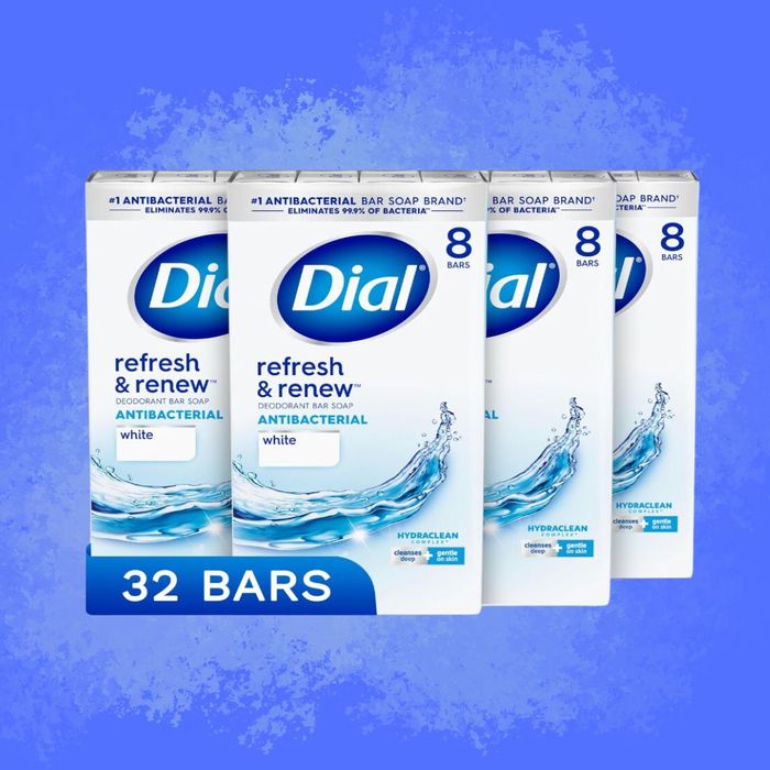 Four boxes of Dial Refresh & Renew Antibacterial Bar Soap, containing a total of 32 bars, showcased against a vibrant blue background.