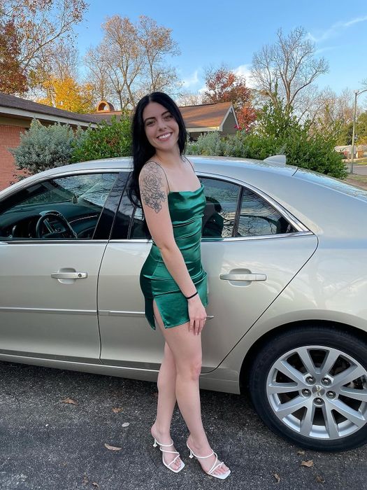 another reviewer showcasing the dress in green