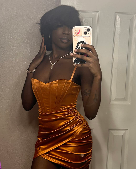 reviewer showcasing a wrap dress