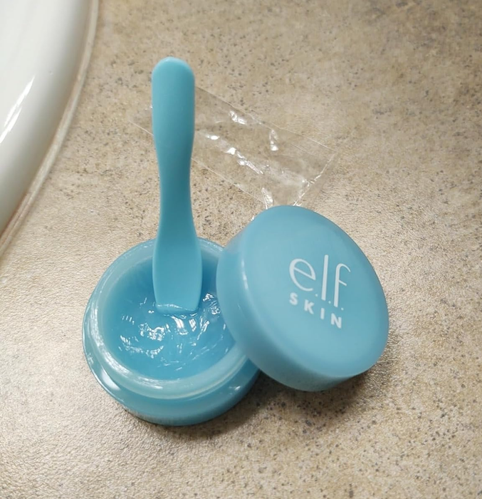 e.l.f. SKIN product opened on a counter, displaying its applicator. Featured in a shopping article