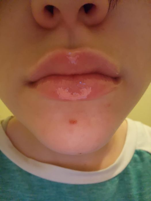 Close-up shot of a reviewer’s smooth, moisturized lips