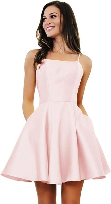 model showcasing a pink short dress