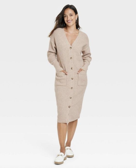 A cozy button-front sweater dress that brings comfort and style together perfectly.