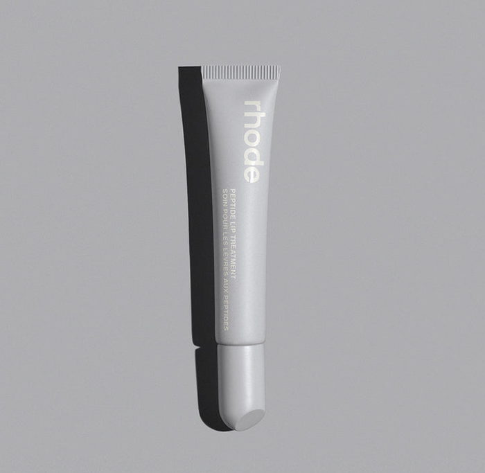 a tube of Rhode lip treatment