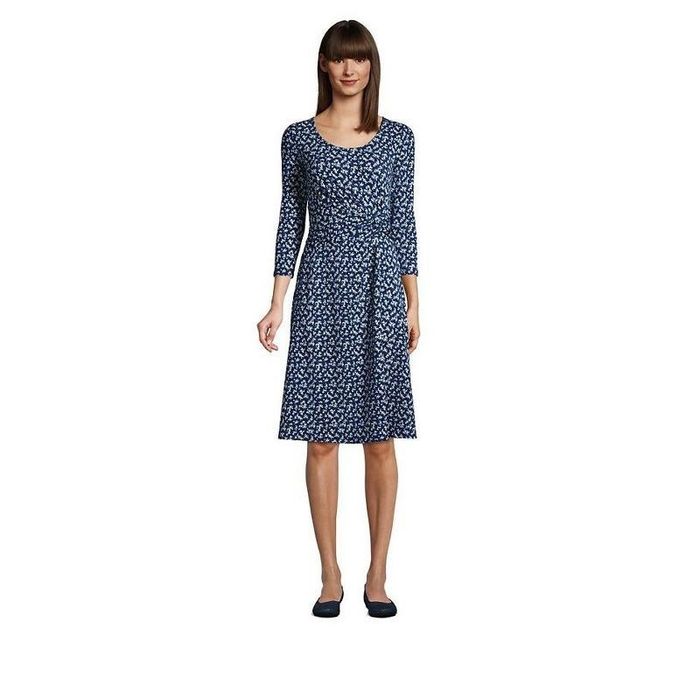 The dress in a vibrant blue hue.