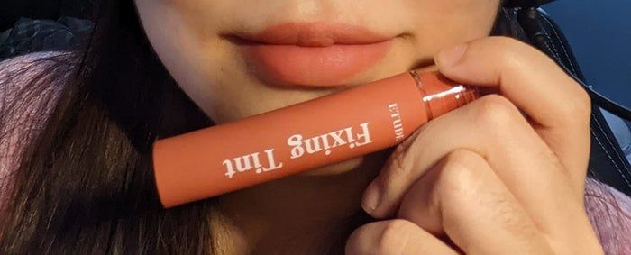 A reviewer wearing the lip fixing tint