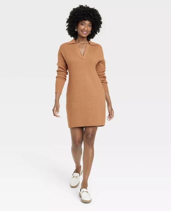 A bright orange polo sweater dress.