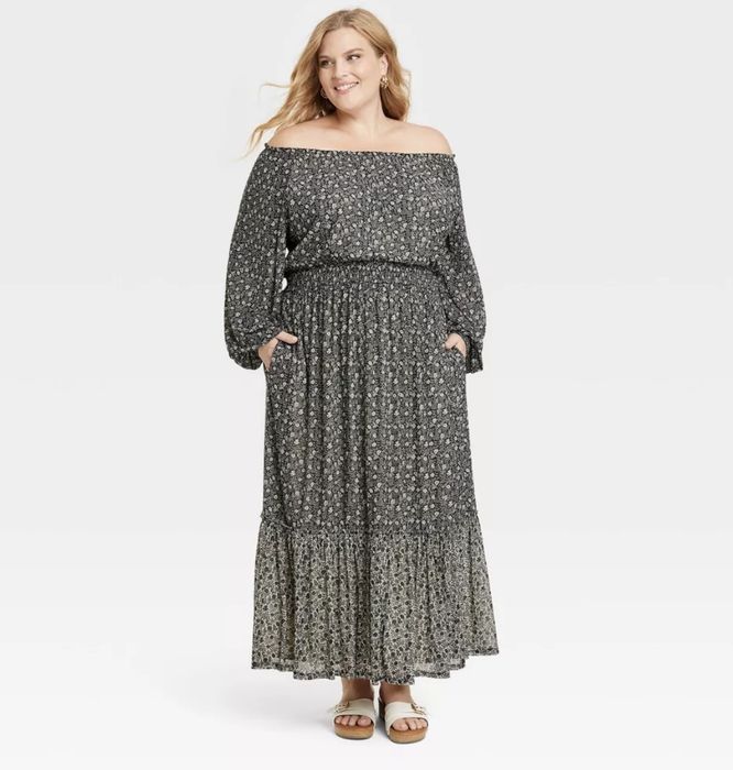 A smocked mesh maxi dress, made for easy elegance and effortless style.