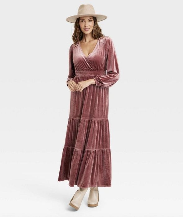 A pink velvet maxi dress