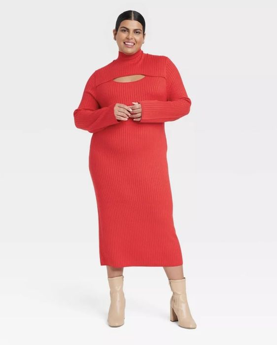 A long red sweater dress with a daring cut-out that shows off your style.