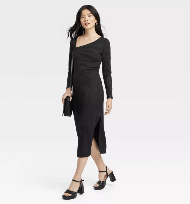 A simple black long dress that radiates timeless sophistication.