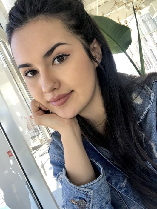 Mytour Editor Kayla Suazo showcasing clear skin