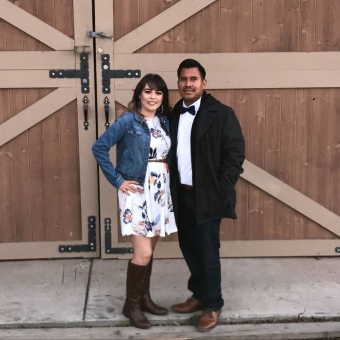 Reviewer wearing the white dress, paired with a jean jacket and boots.