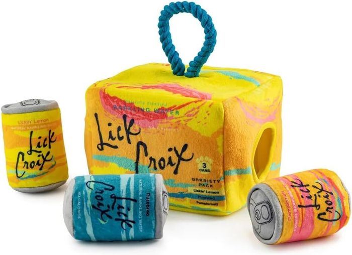 A set of dog toys designed to look like cans of carbonated water, playfully labeled