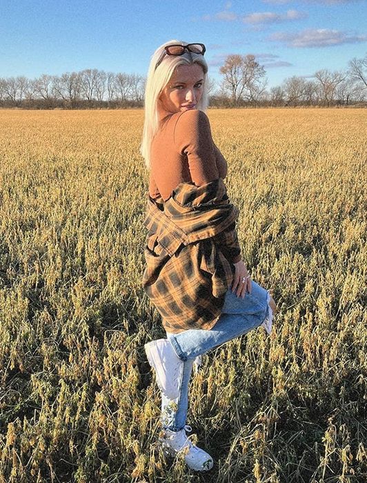 A reviewer showcasing the brown shacket