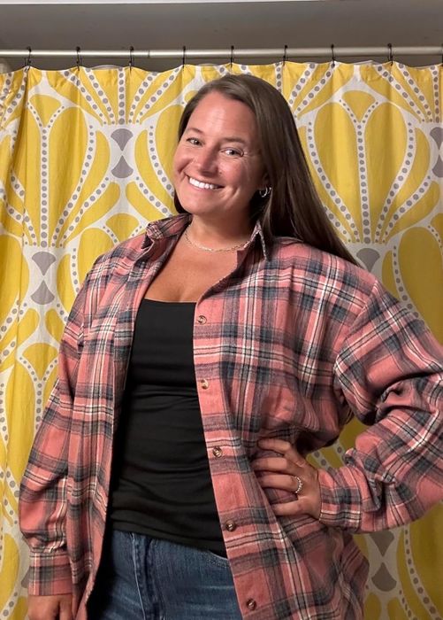 A reviewer modeling the pink shacket