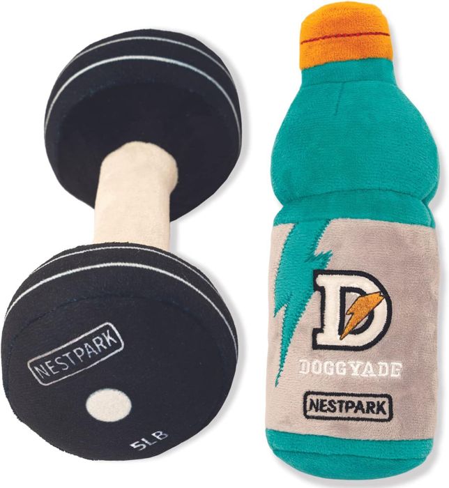 Two Nestpark dog toys: a black dumbbell marked