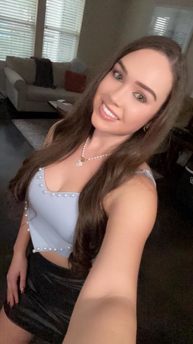 A reviewer modeling the blue top