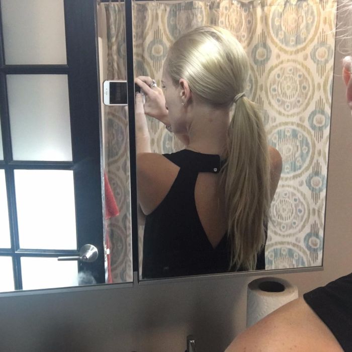 Reviewer showcasing long hair before using the spin pins