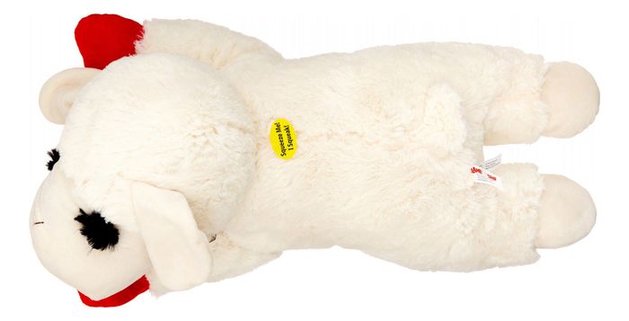A plush lamb toy resting on its side, adorned with a red bow, available for purchase