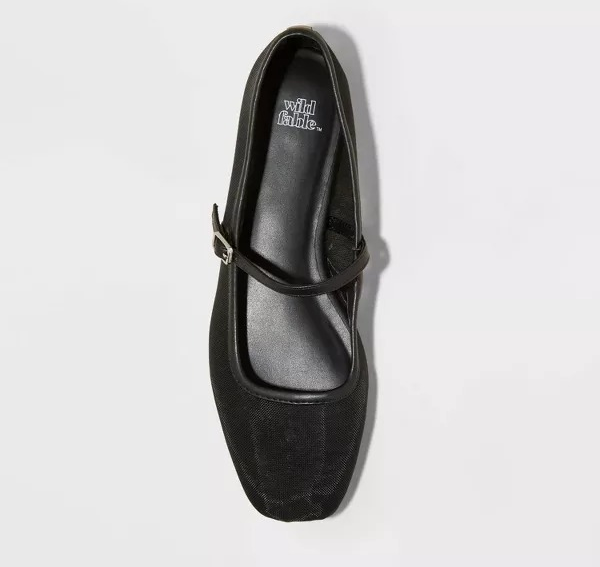 Black mesh Mary Jane flats featuring an adjustable strap from Wild Fable