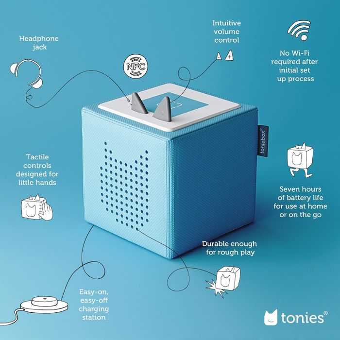 A blue Toniebox audio player with intuitive controls, NFC connectivity, tactile buttons, a headphone jack, easy charging, and a seven-hour battery life, designed for kids.