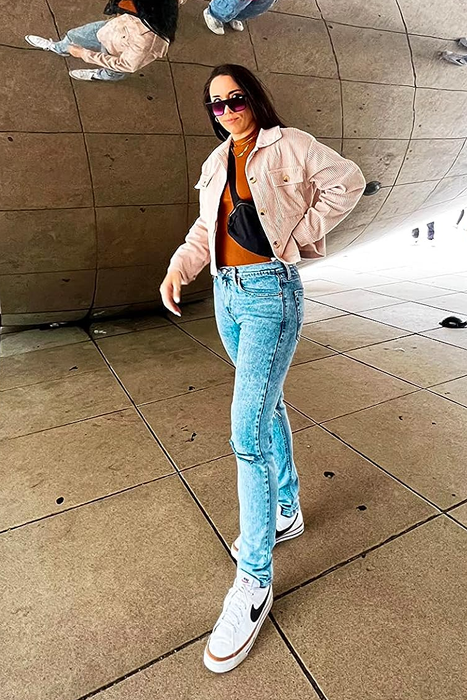 a reviewer showcasing the cropped jacket