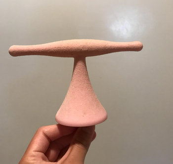 The same perch now spotless after using the spray