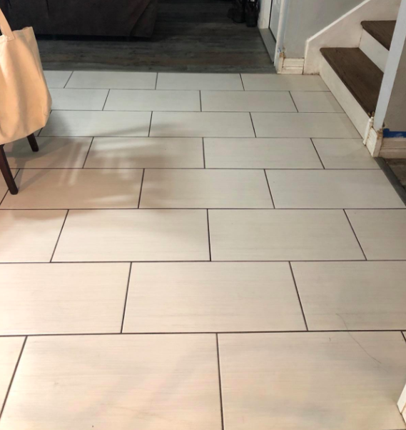 The same reviewer's tile floor is now spotless and gleaming.