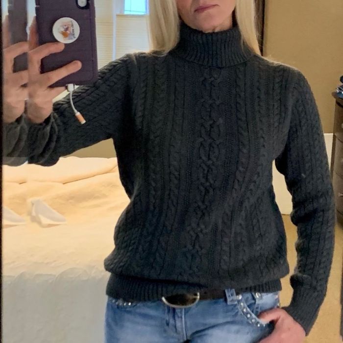 Reviewer modeling the sweater