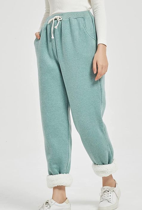 model wearing the light green joggers