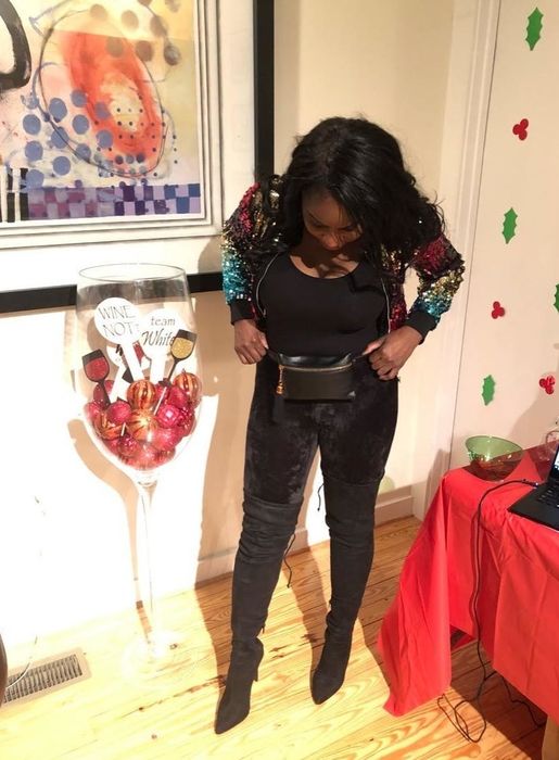 Reviewer modeling the black velvet leggings